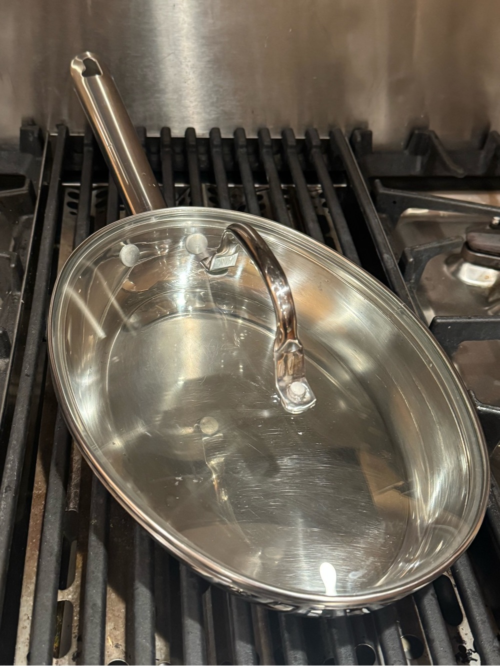 Wolfgang puck cafe collection 12” oval skillet 18/10 stainless steel with lid